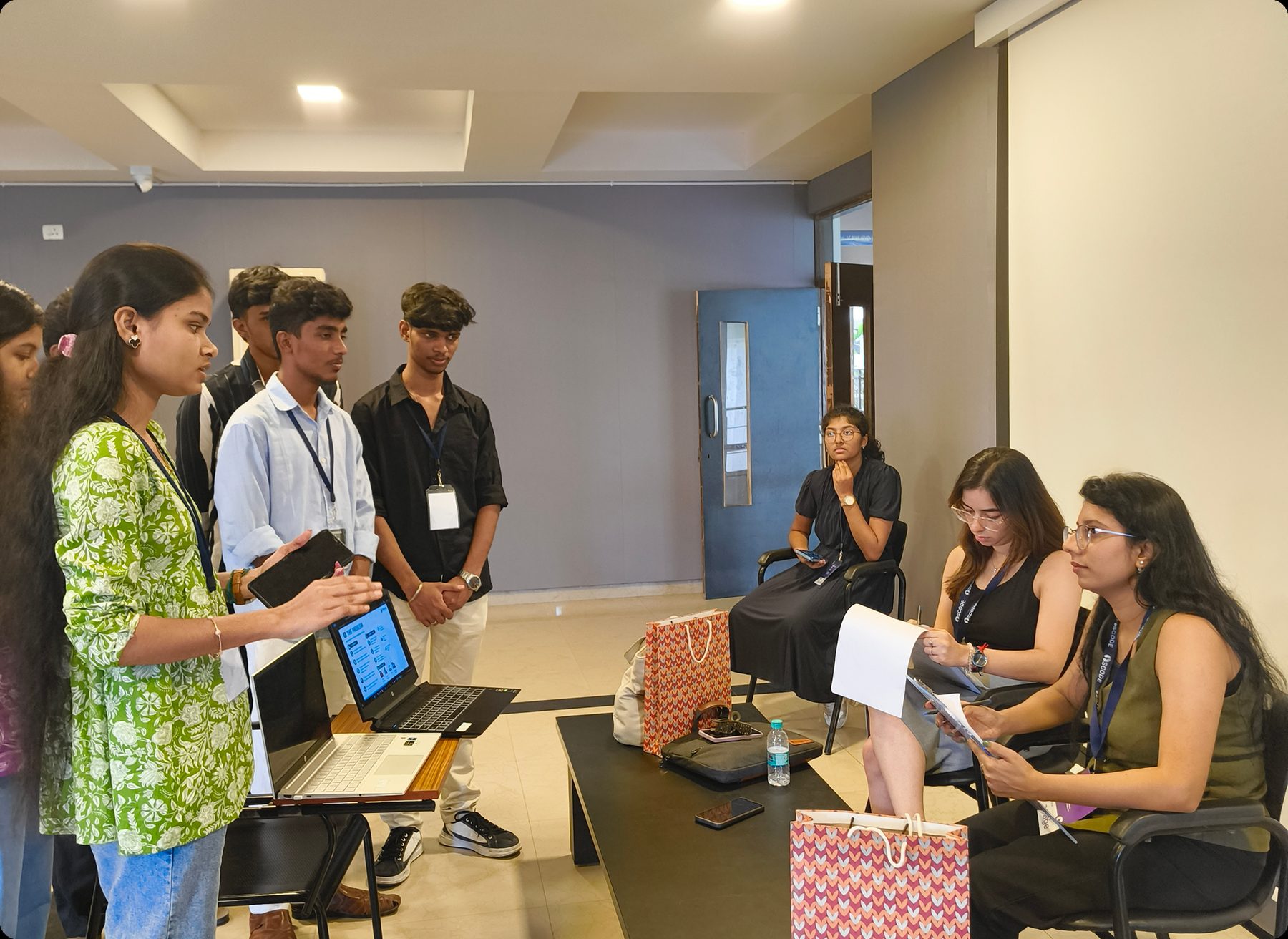 Reviewing a team's work during hackathon judging.